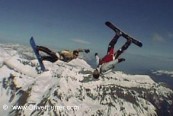 snowboard skydive jump with glacier landing